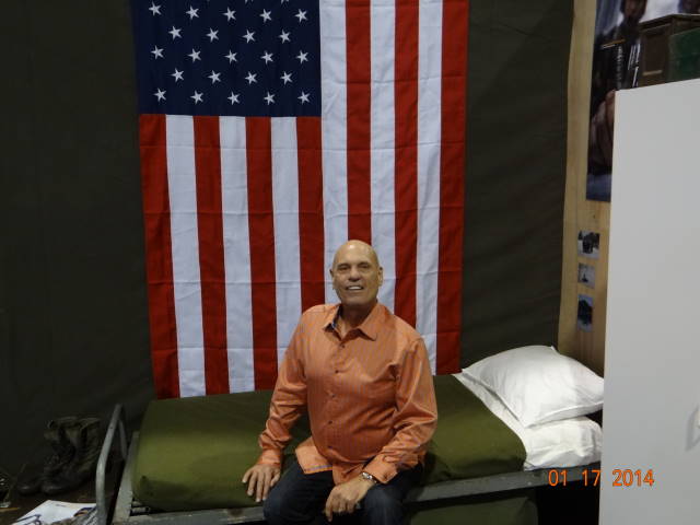 Ken Baxter, Founder of We The People, showing support for America in front of the United States flag